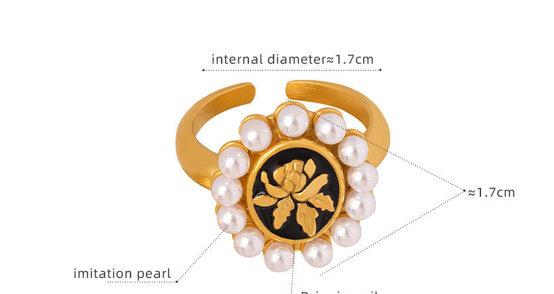 Adjustable gold-plated baroque pearl ring featuring sunflower oil drop detail and black enamel center
