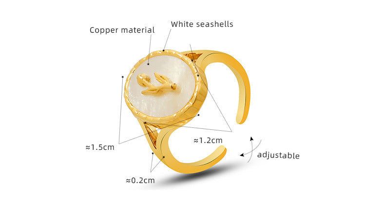 Gold open ring with white seashell design, copper material, adjustable size and product specifications displayed on a white background