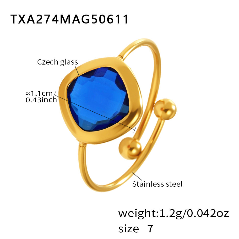 Blue sea glass bracelet with gold stainless steel and material labels
