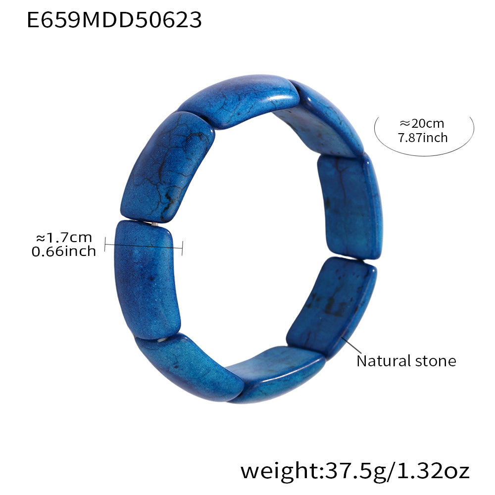 Stretch blue gemstone tennis bracelet showing weight and length dimensions – white background