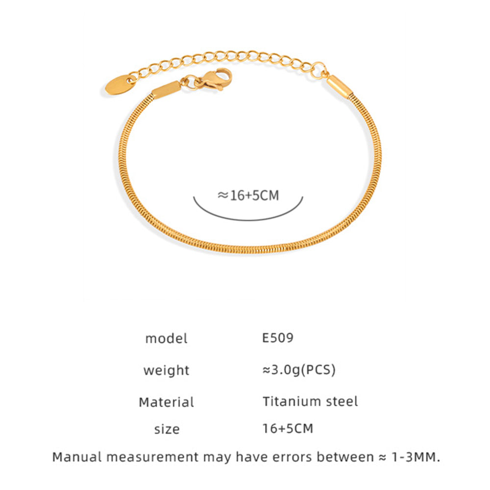 Gold bracelet with measurement details on a white background