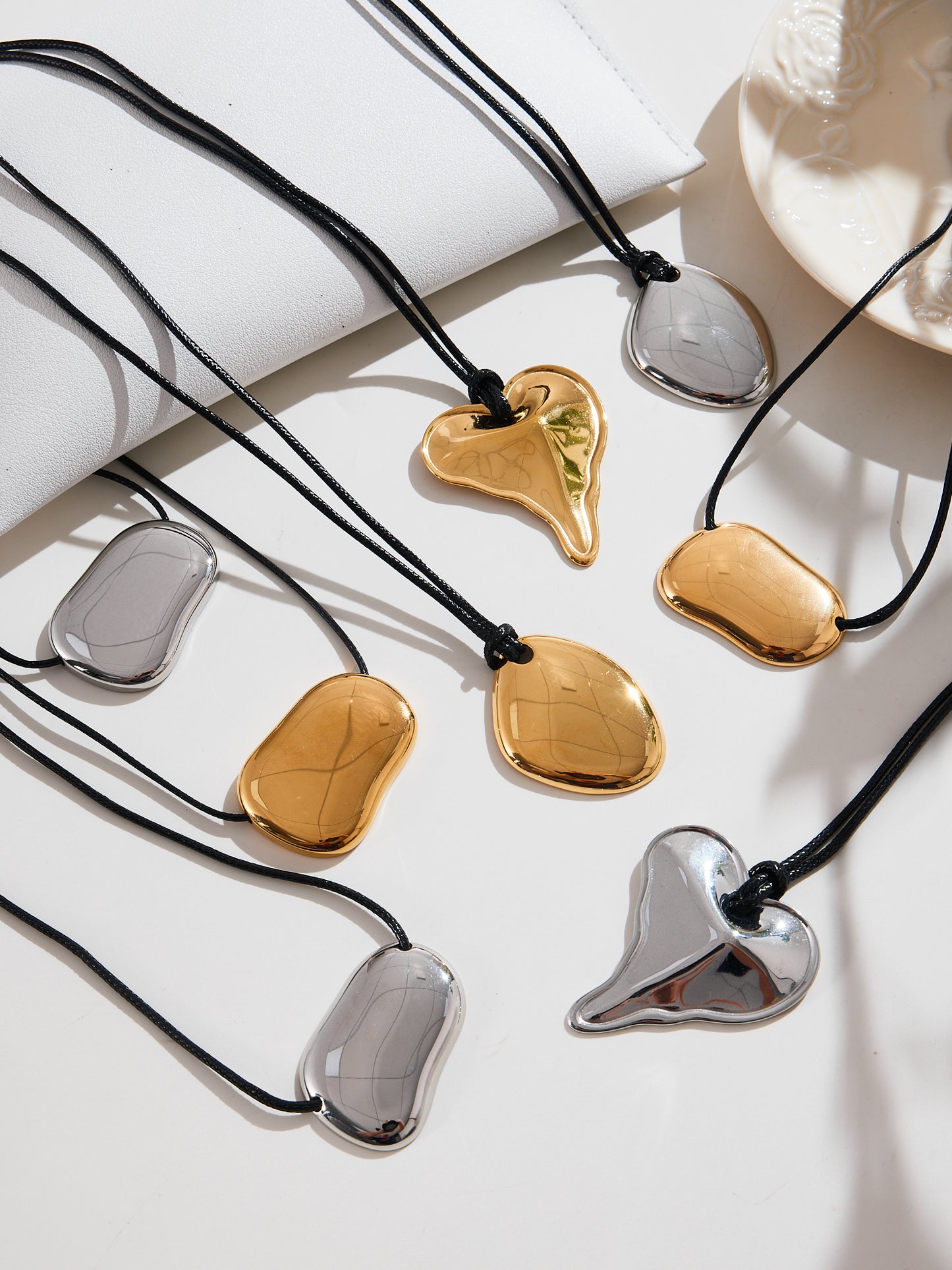 Molten Muse Leather Cord Stainless Steel Necklace Collection