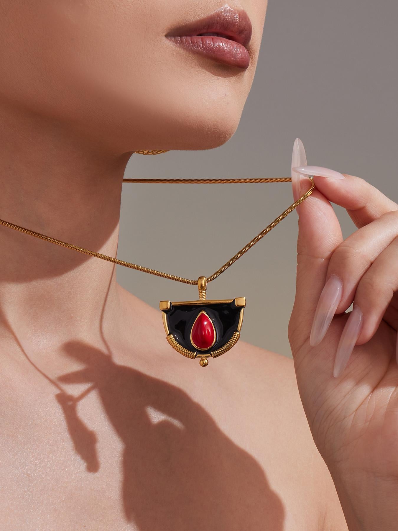 Gold Necklace with Black and Red Pendant