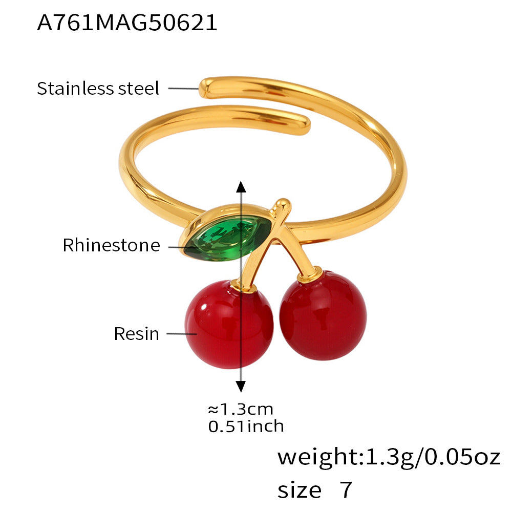 Cherry resin sea glass ring with gold band and rhinestone, labeled for specs