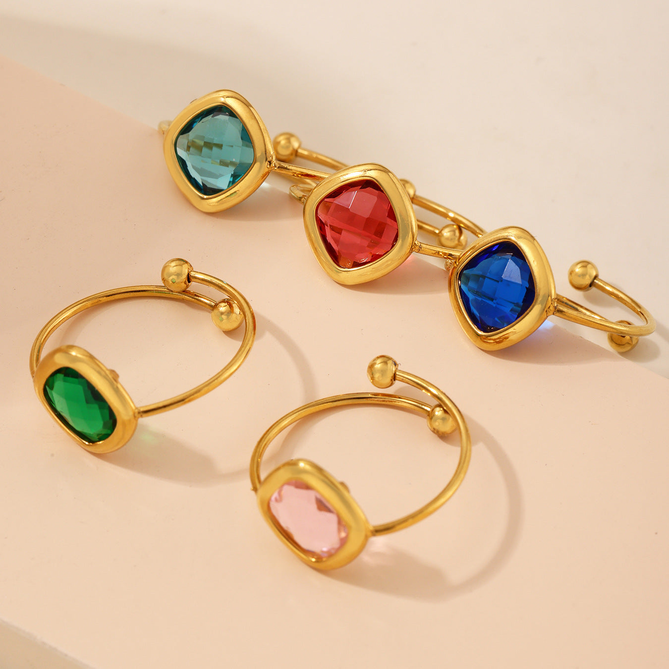 Set of gold sea glass bracelets with vibrant Czech gemstones