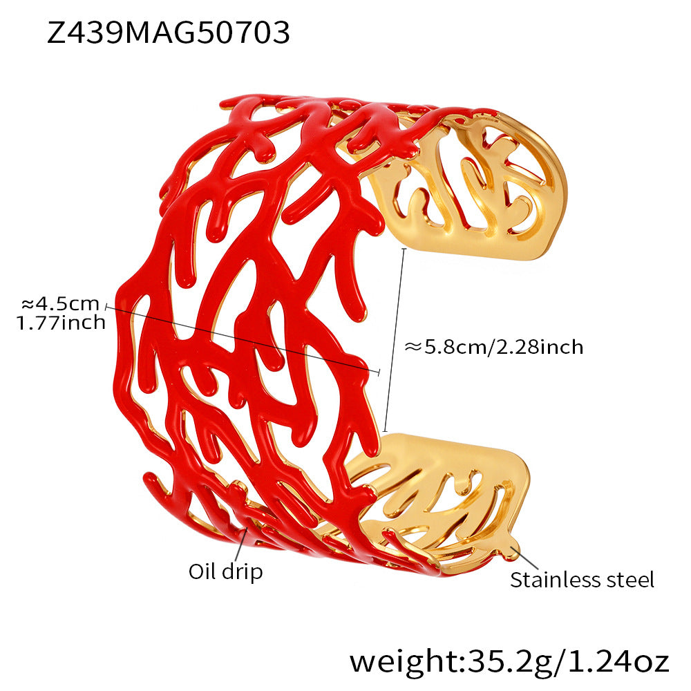 Red and gold coral red stainless steel open bangle with measurement and weight details on a white background
