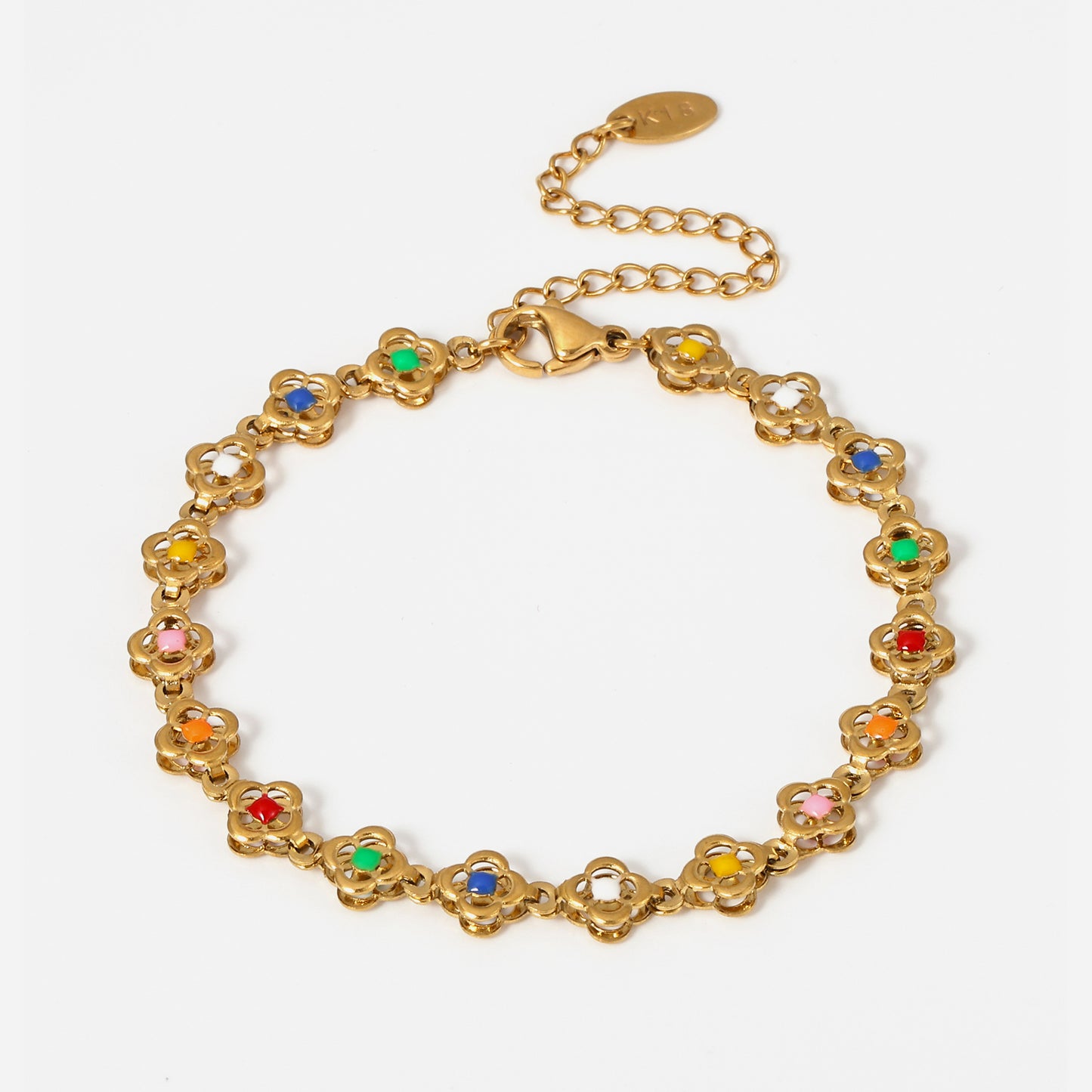 Floral mini tennis bracelet in gold on white background