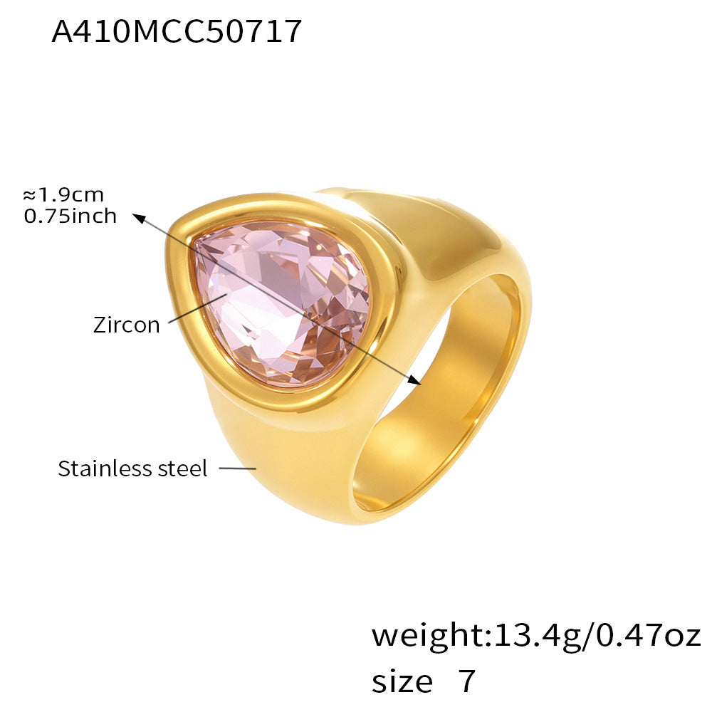 Gold chunky zircon ring with pink zircon stone, displayed with measurement details on a white background.