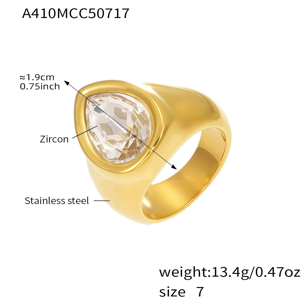 Gold chunky zircon ring featuring a zircon stone, with measurement details on a white background.