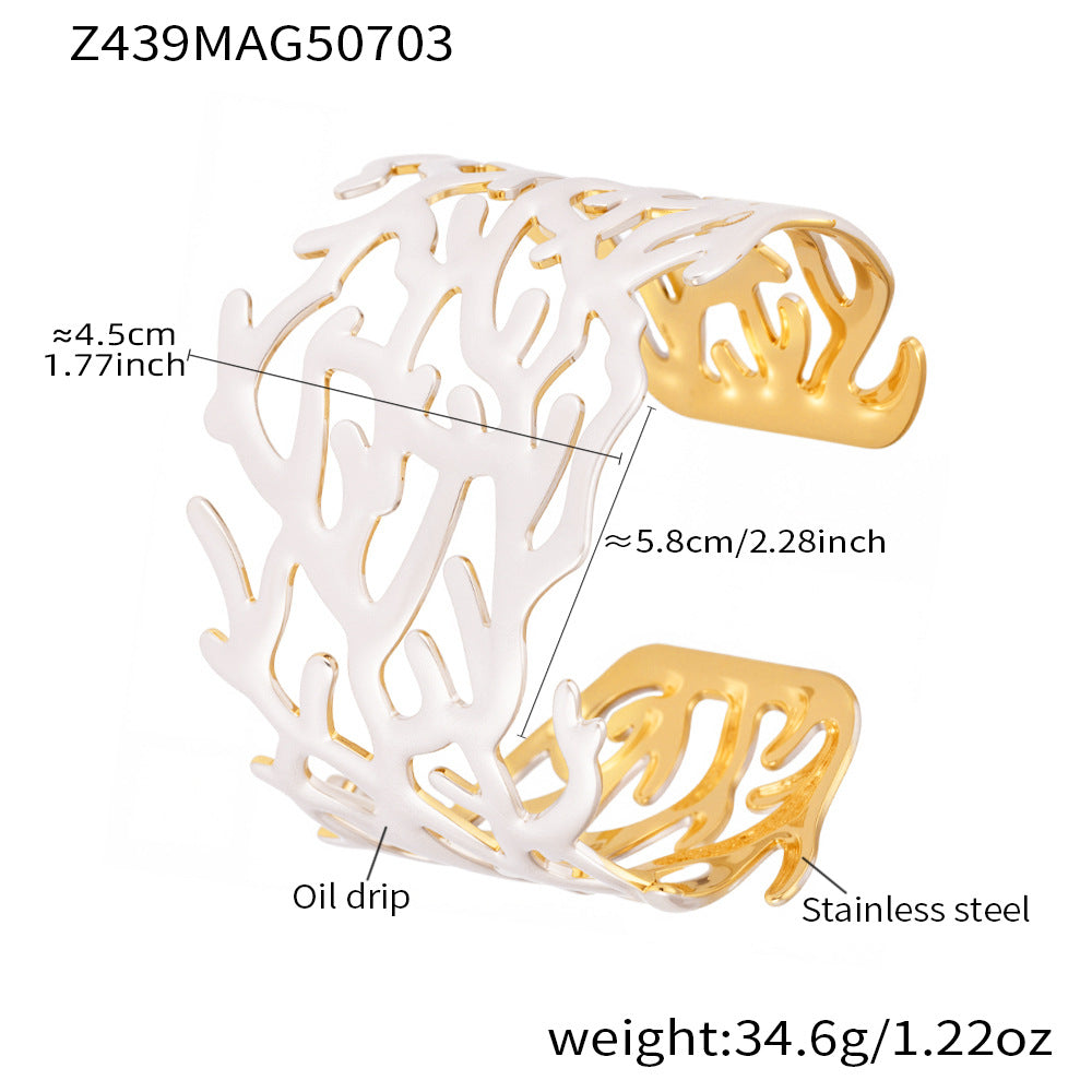 Gold and white coral bangle on oil drip-style tray with size and material information shown on a white background