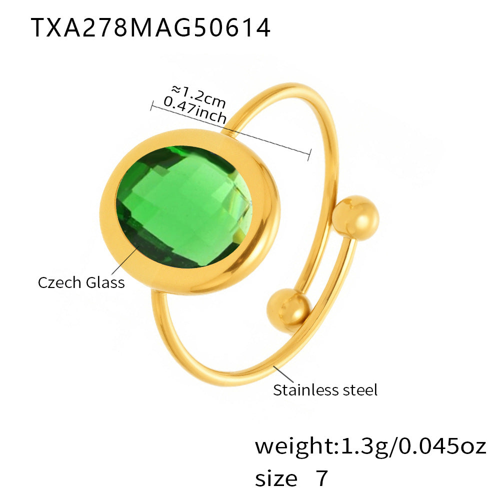 Green sea glass ring with open stainless steel design and size guide