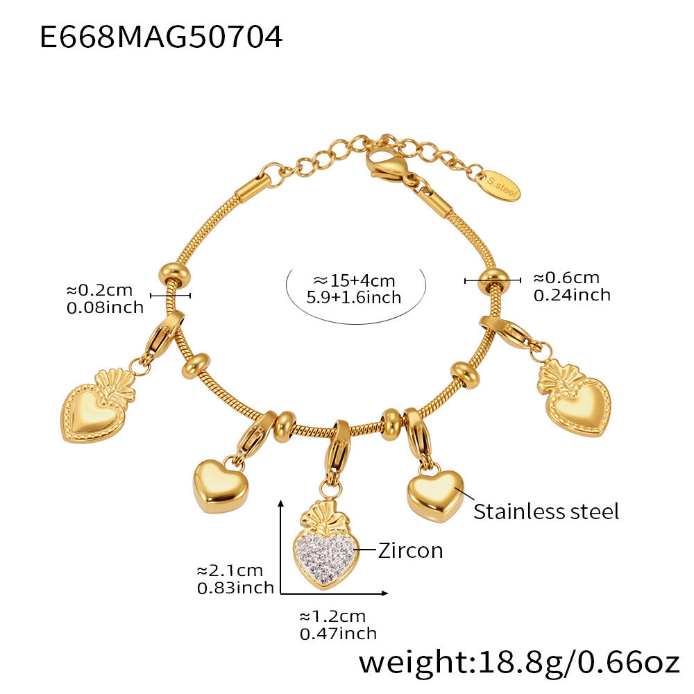 Close-up of gold heart charm bracelet from DIY kit with measurements, featuring durable, non-tarnish stainless steel.