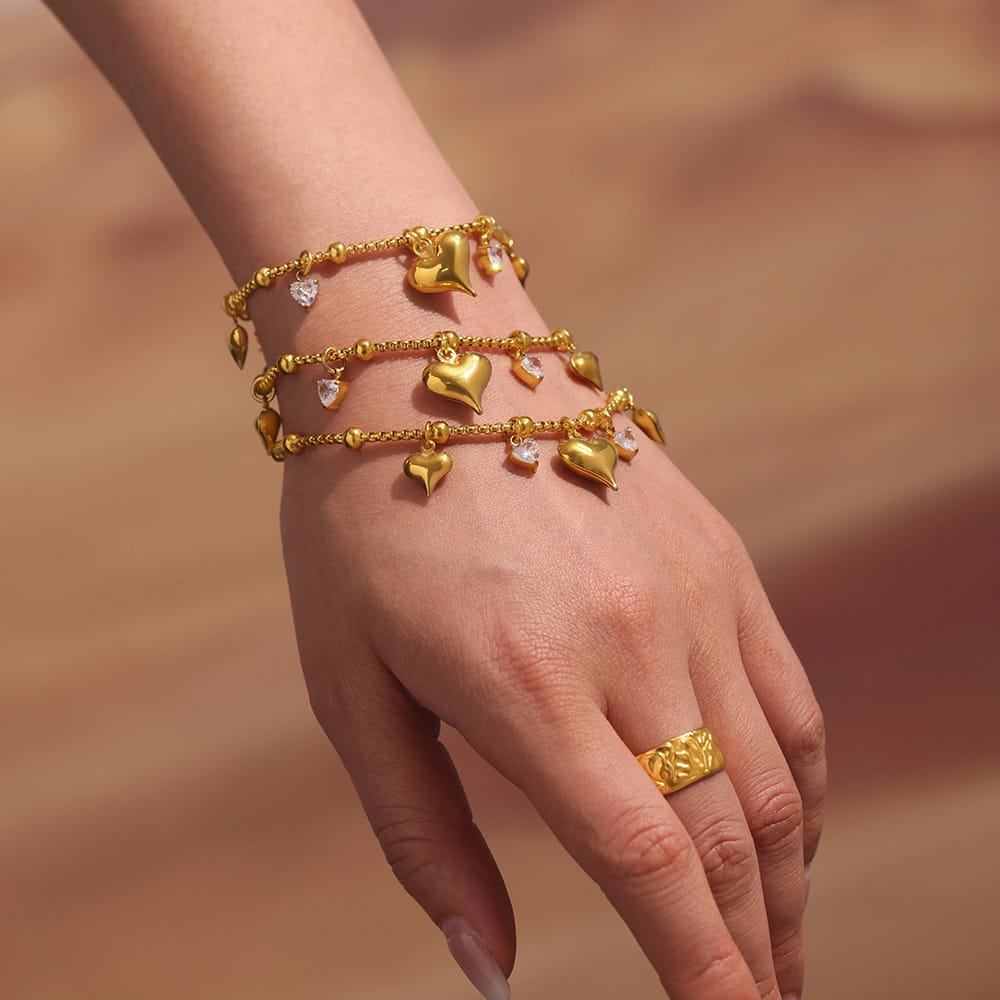 Model wearing Zircon Heart Charm Tennis Bracelet with casual outfit, highlighting waterproof and stylish design