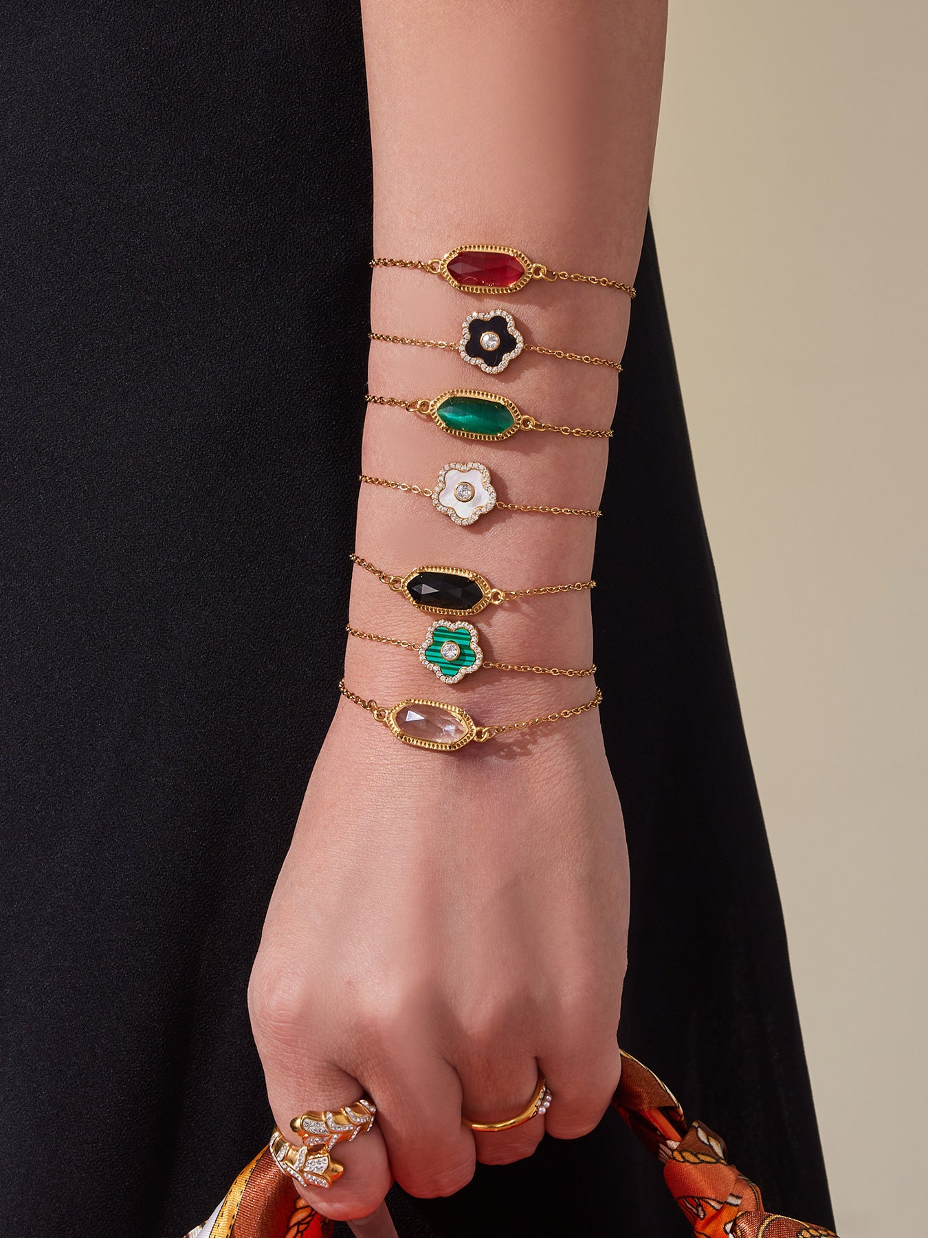 Gemstone bracelet available in green, red, black and clear colors