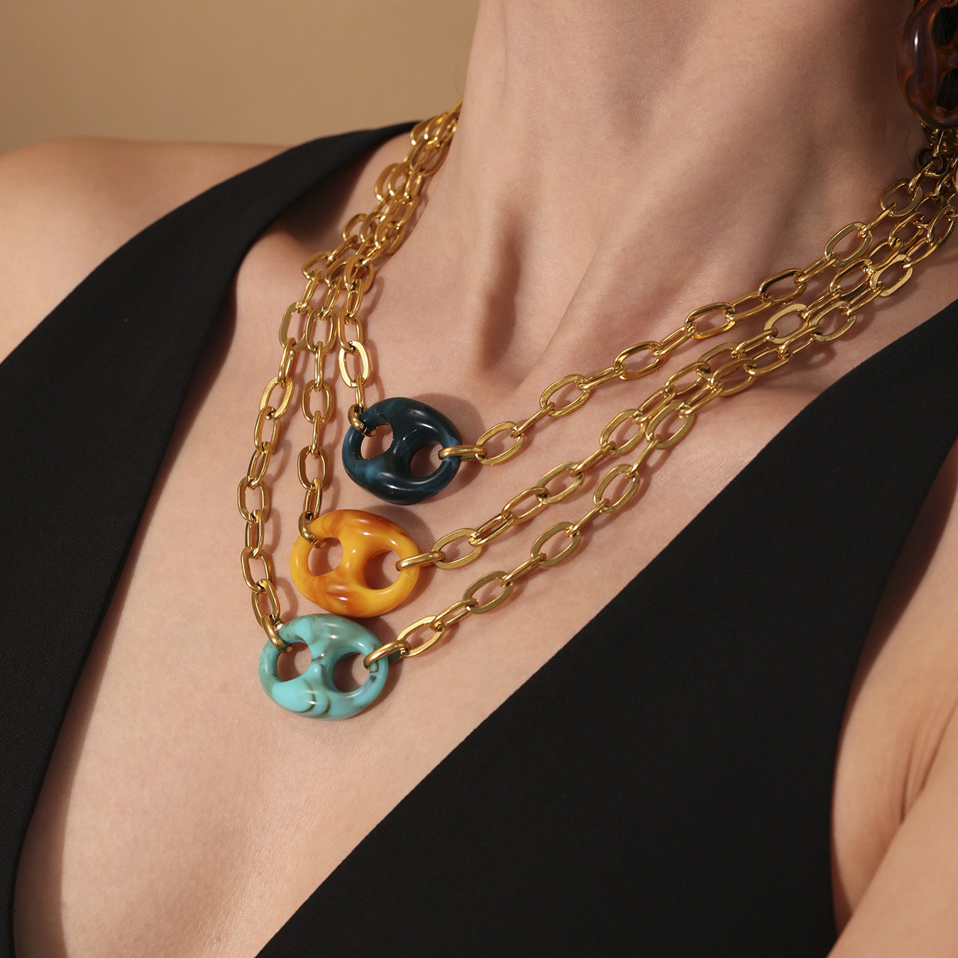 Model wearing colorful resin pig nose chain necklace for summer look