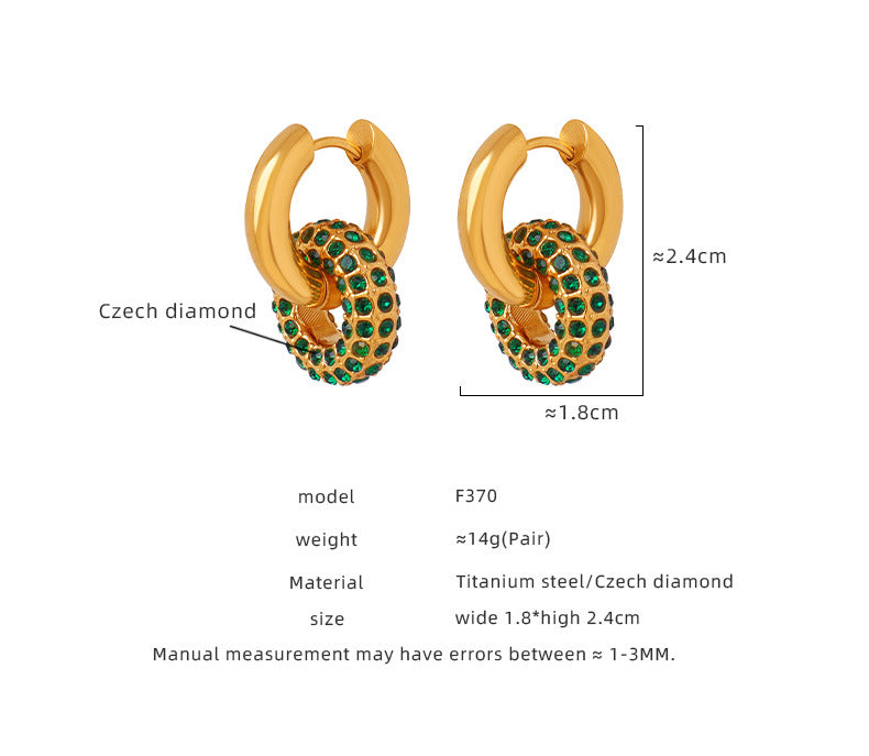 Gold hoop earrings with green gemstones and measurement details on a white background