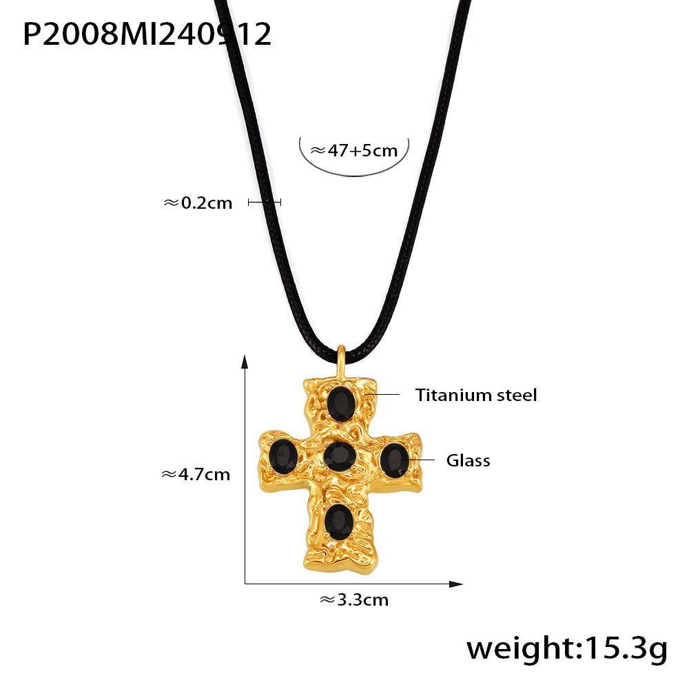 Gold cross pendant necklace with measurements on a white background