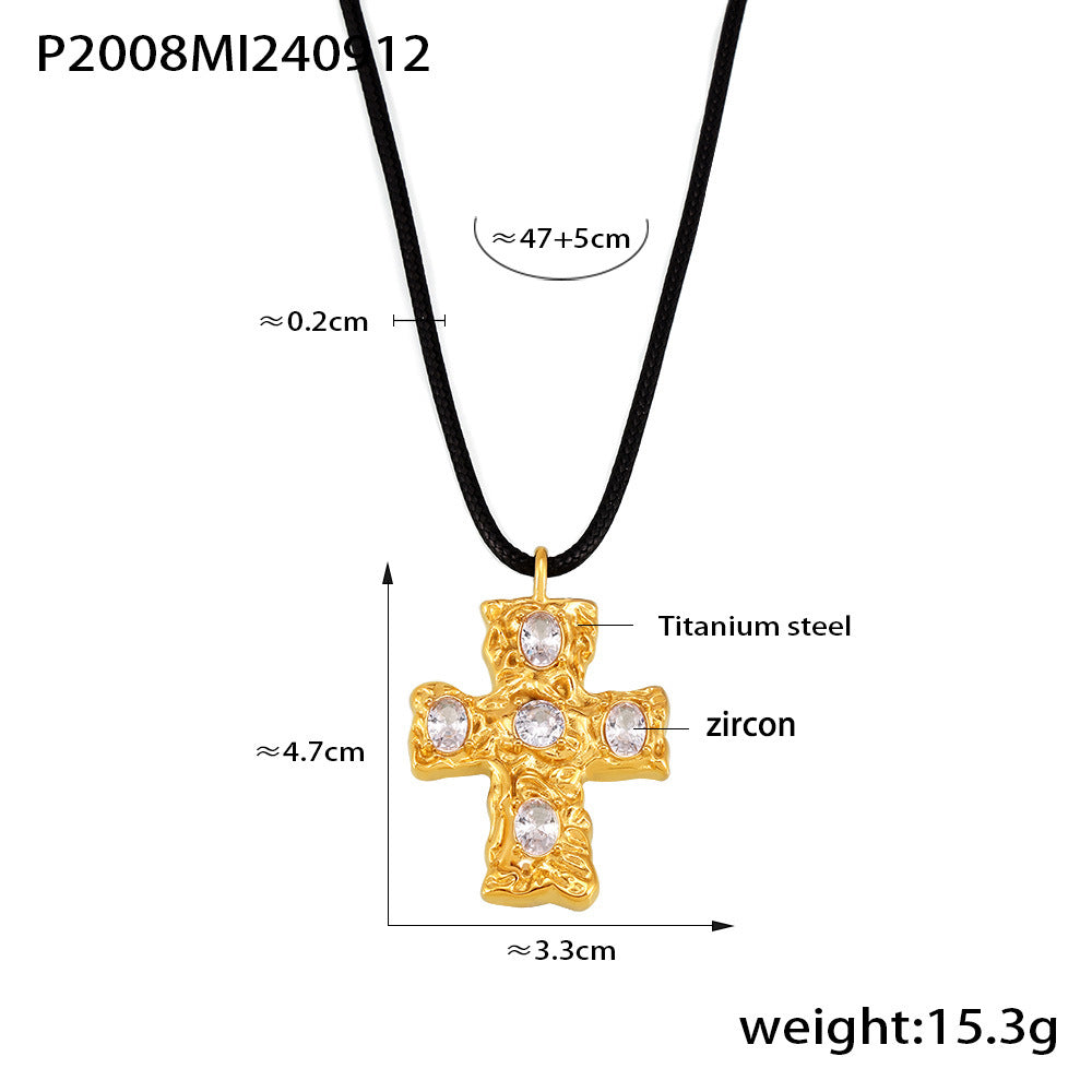 Gold cross pendant necklace with measurements and material details on a white background