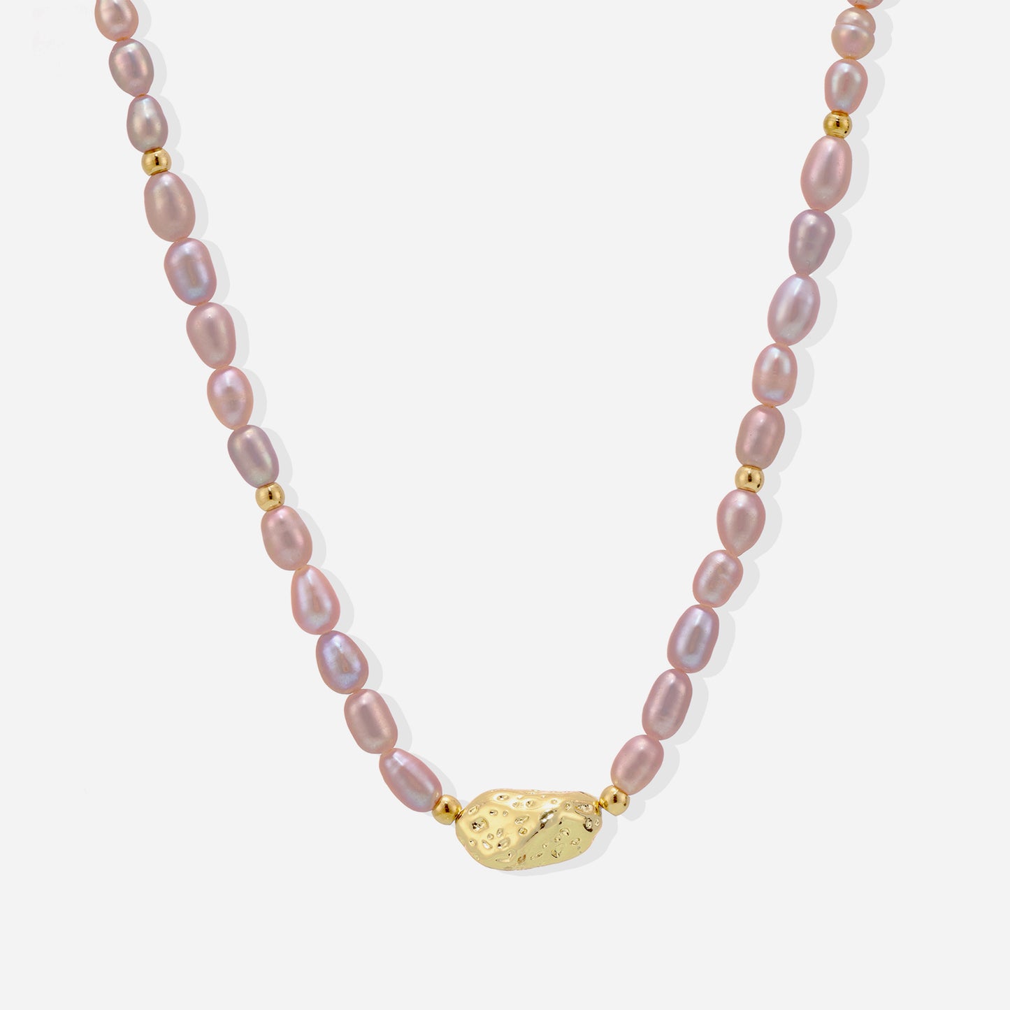 Minimalist gold freshwater pearl necklace displayed on white background