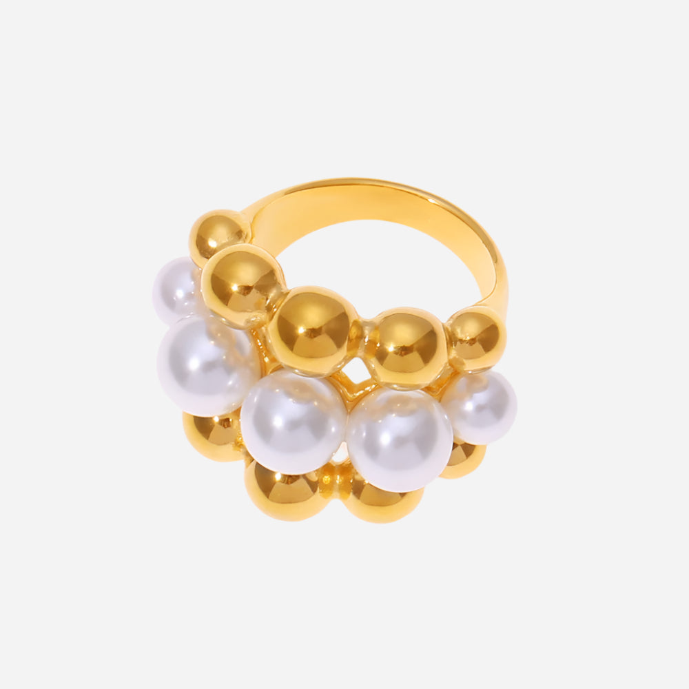 Adjustable gold pearl ring with beaded design on white background – elegant women’s jewelry