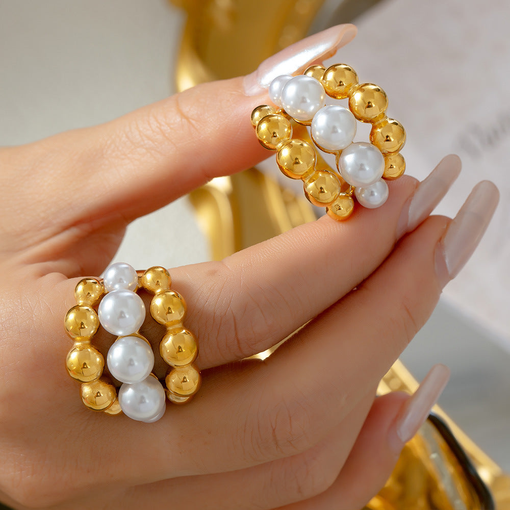 Gold and pearl beaded bracelets worn on wrist – matching jewelry with pearl rings