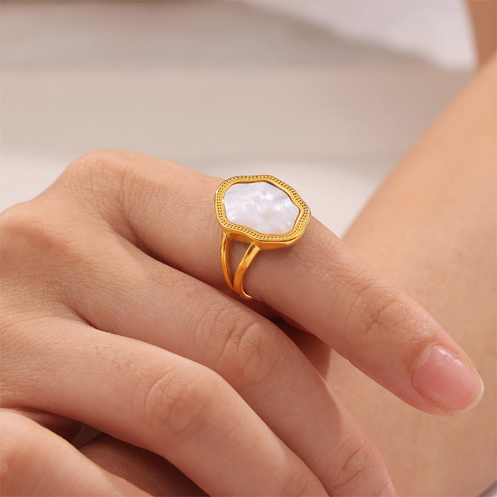 Mother of Pearl ring worn on hand – gold-plated stainless steel with seashell inlay