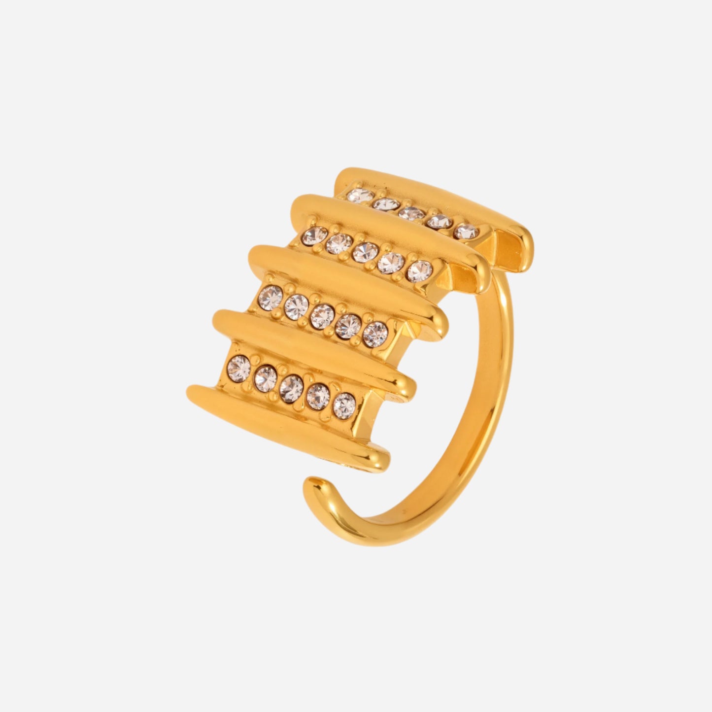 Gold ring with embedded crystals on a white background