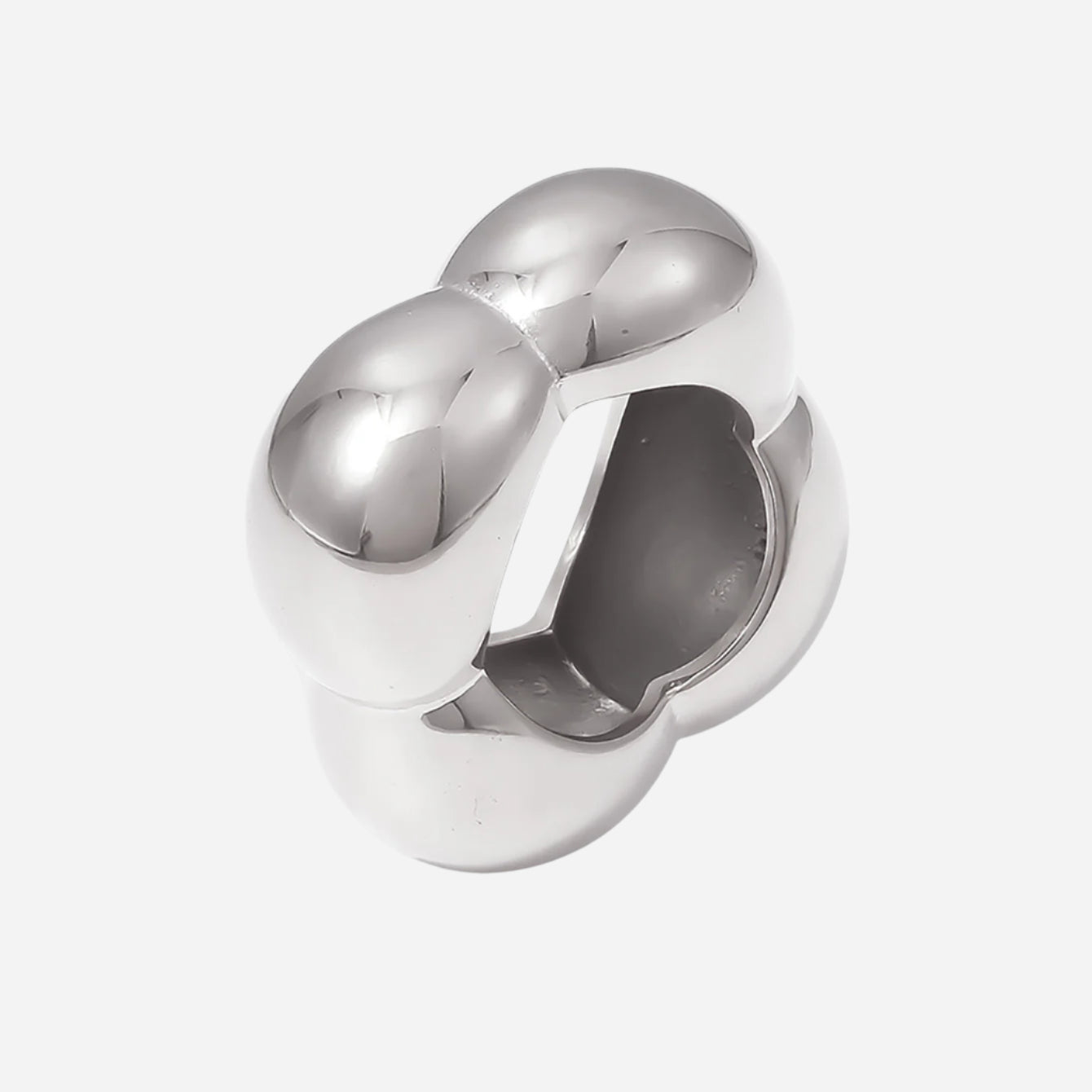 Silver ring with a unique design on a white background