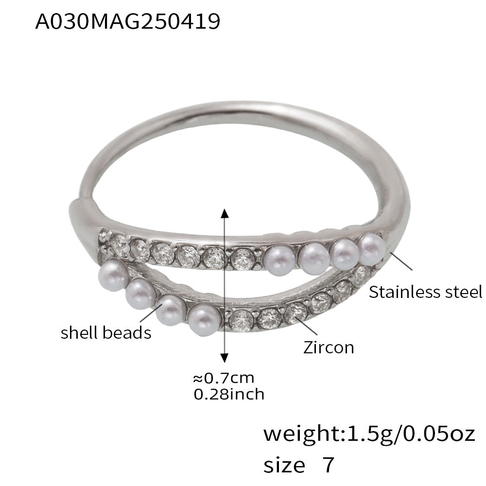 Silver stainless steel pearl ring with zirconia details and measurement chart