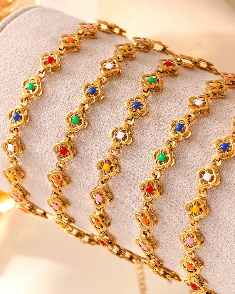 Mini tennis bracelet stacked with beaded and charm bracelets