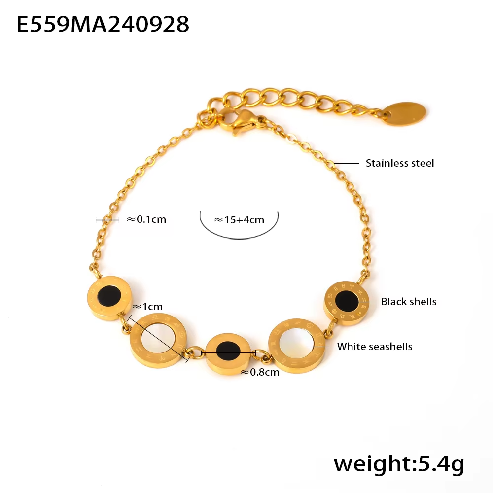 Gold and black tennis bracelet with seashell charms and stainless steel details on a white background