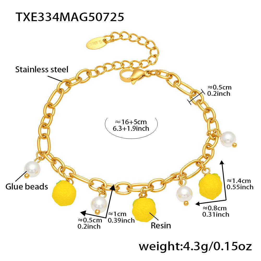 Gold bracelet with yellow and white beads, labeled with measurements and material types.