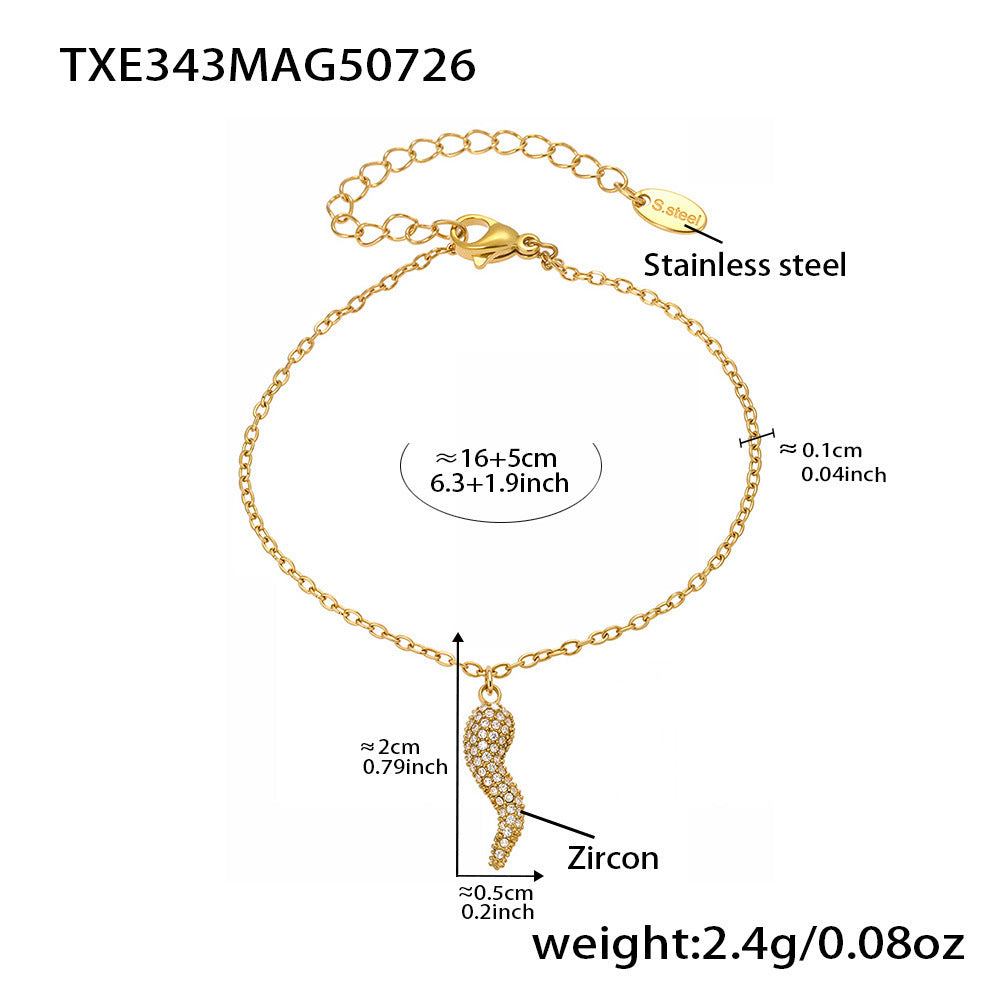 Gold bracelet with measurements on a white background