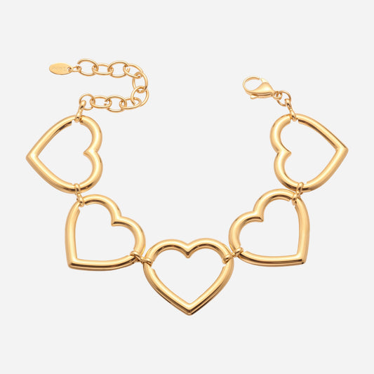 Gold bracelet with heart-shaped links on a white background
