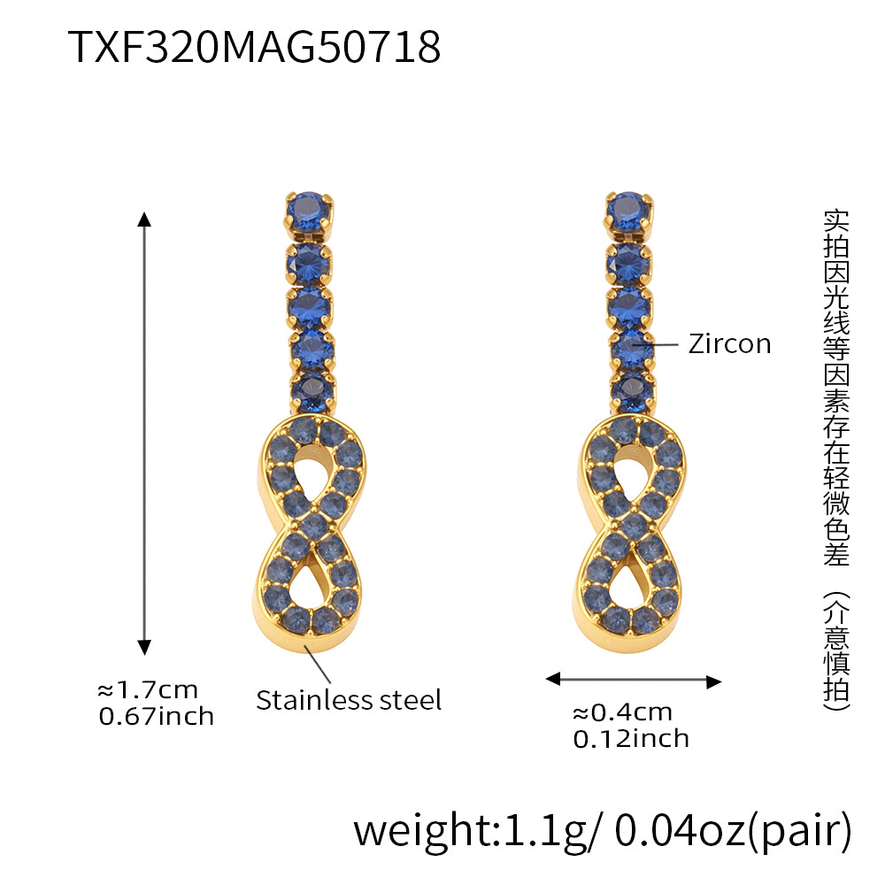Gold earrings with blue stones and technical details on a white background
