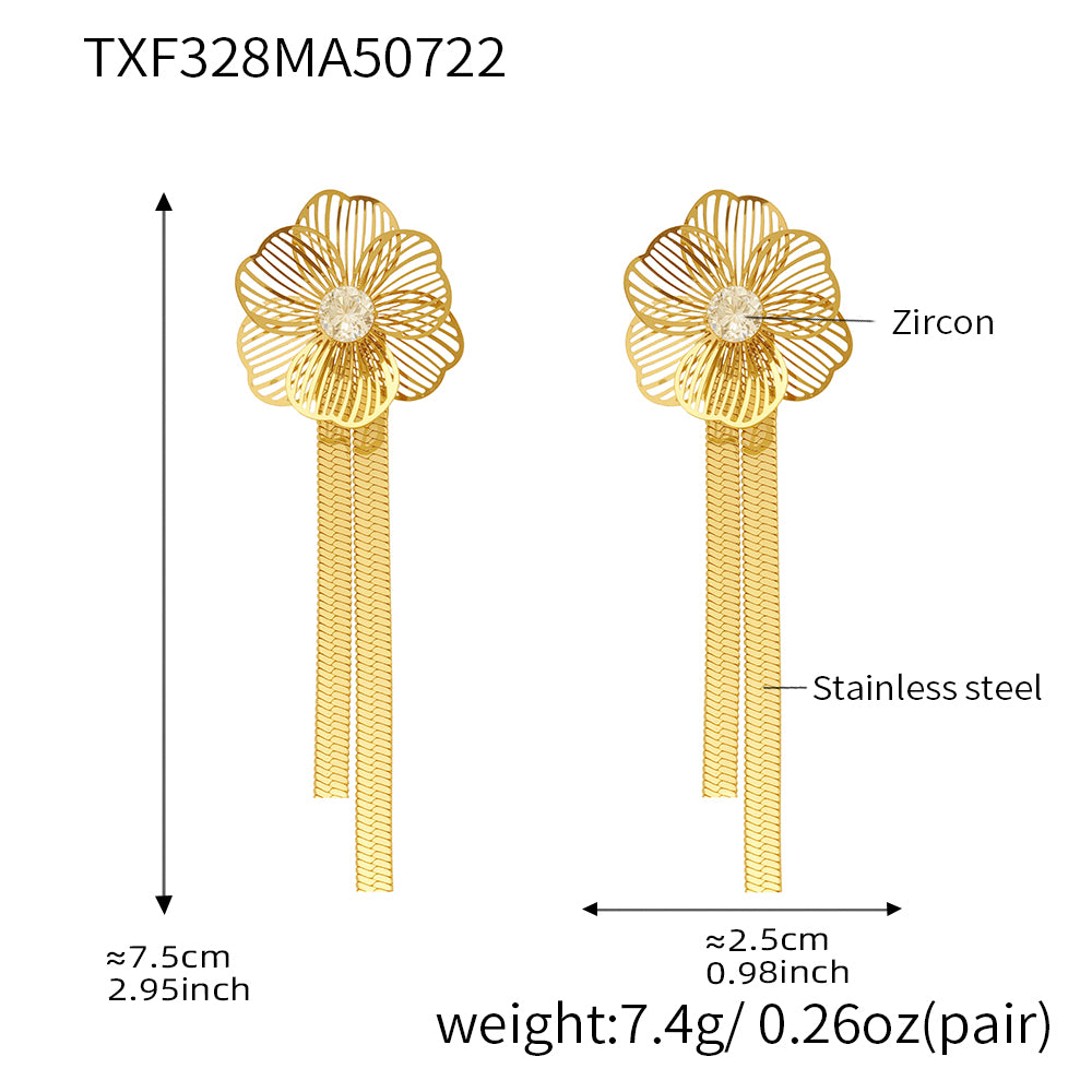 Gold earrings with floral design and measurements on a white background