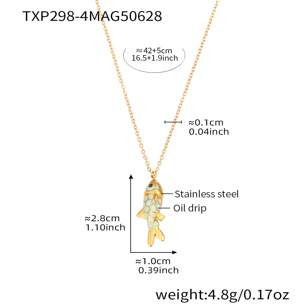 Gold necklace with fish pendant, showing measurements and material details on a white background.