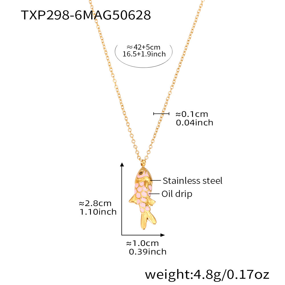 Gold fish-shaped pendant necklace with measurements on a white background