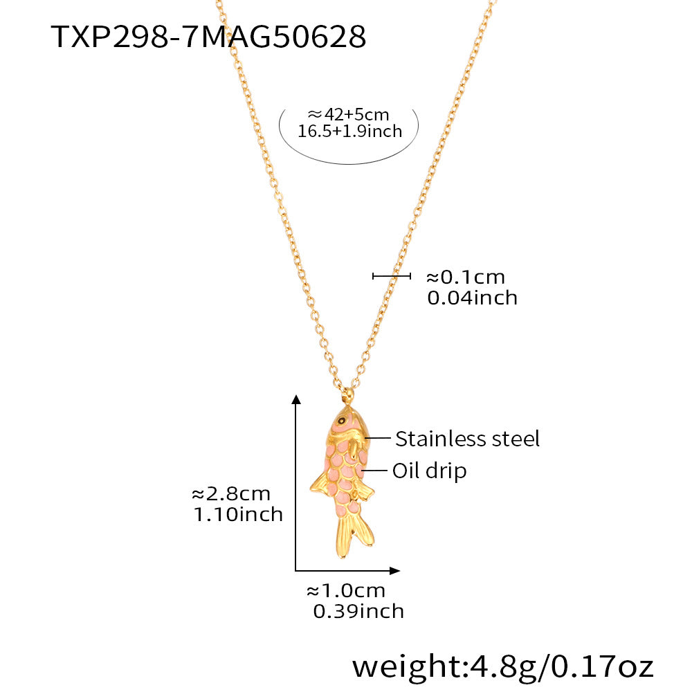 Gold fish-shaped pendant necklace with measurements on a white background
