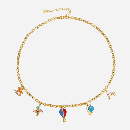 Gold necklace with colorful charms on a white background