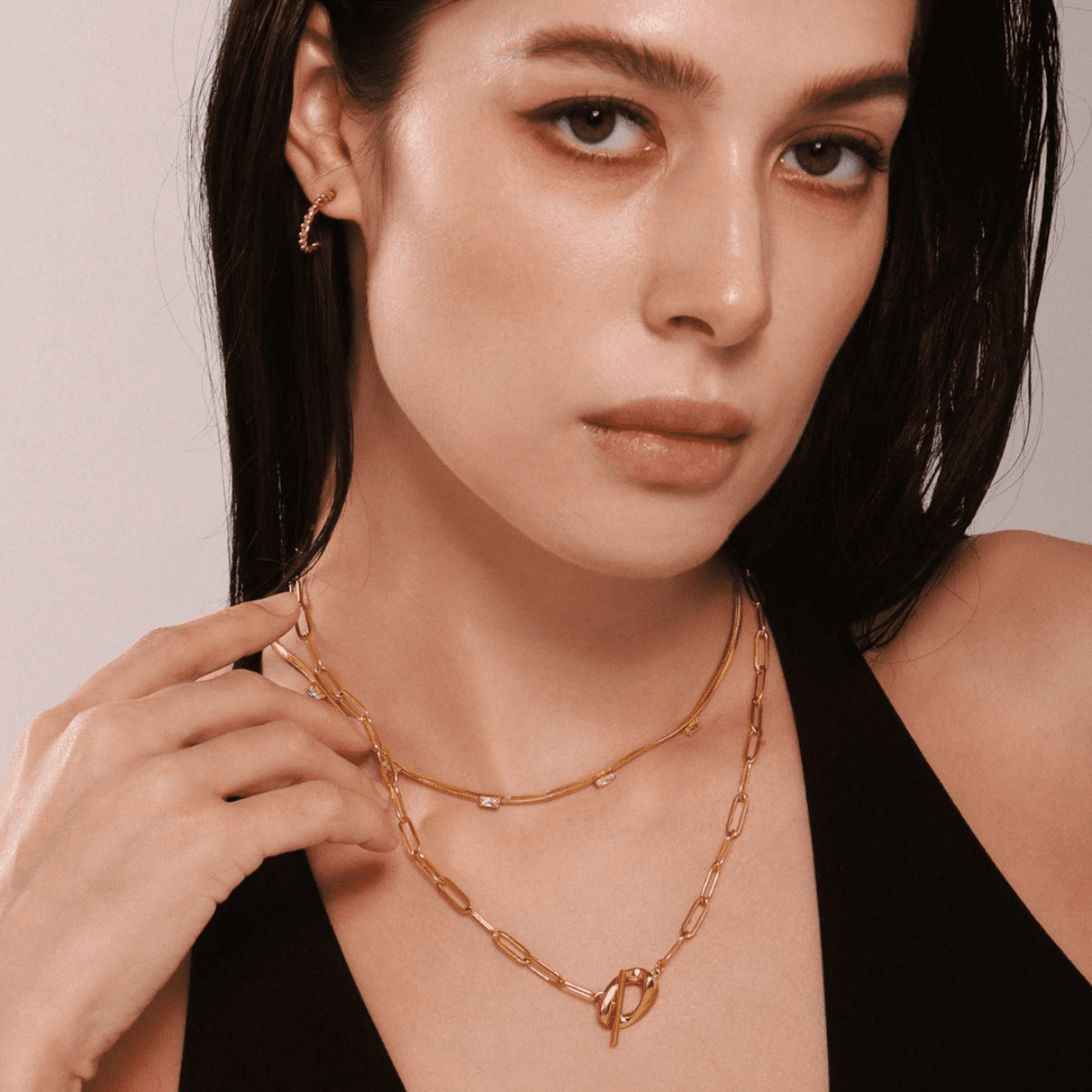 Close-up of model wearing Architect CZ Blade Tennis Choker in stainless steel