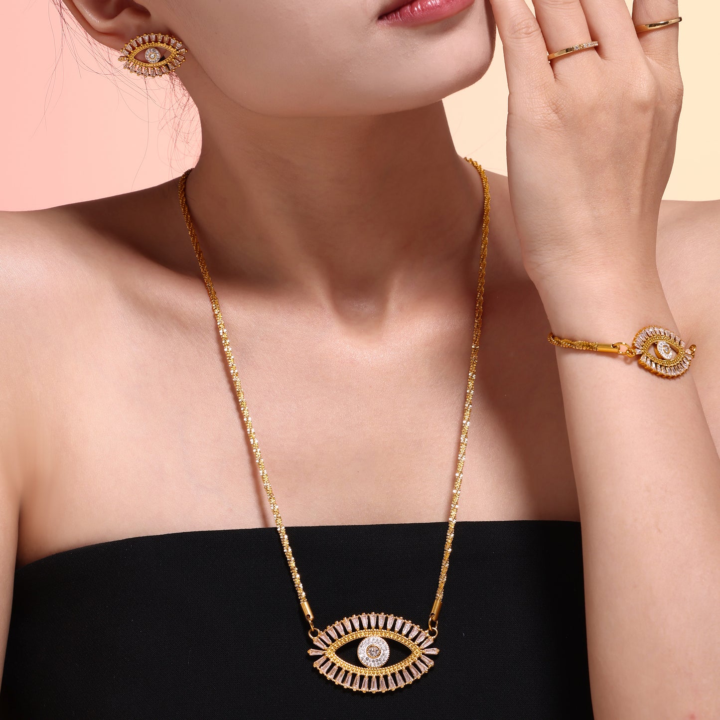 Female model wearing Mystic Evil Eye Zircon Bracelet solo – delicate zircon details and sleek metal shine