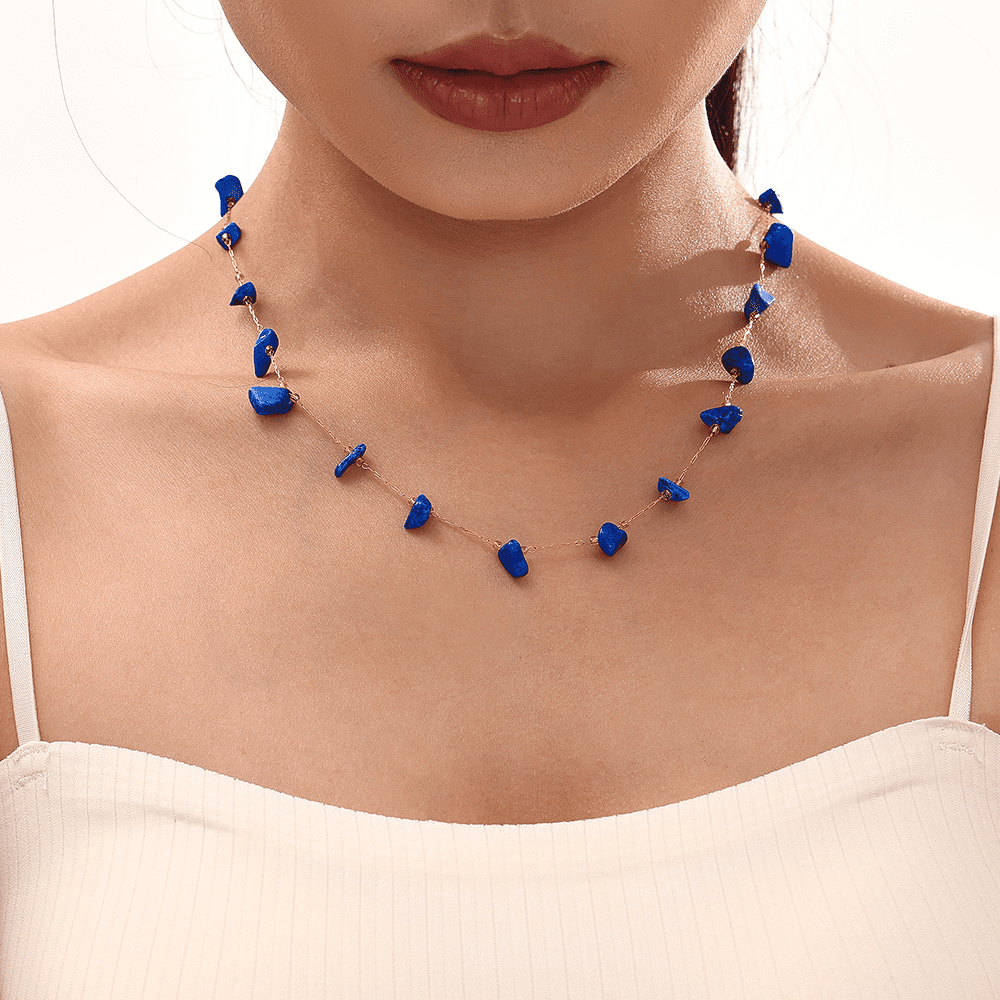 Model wearing blue natural stone tennis necklace