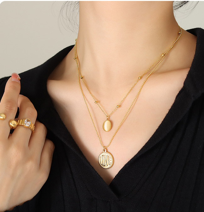 Model wearing Cat's Eye Stone LOVE Round Card Necklace