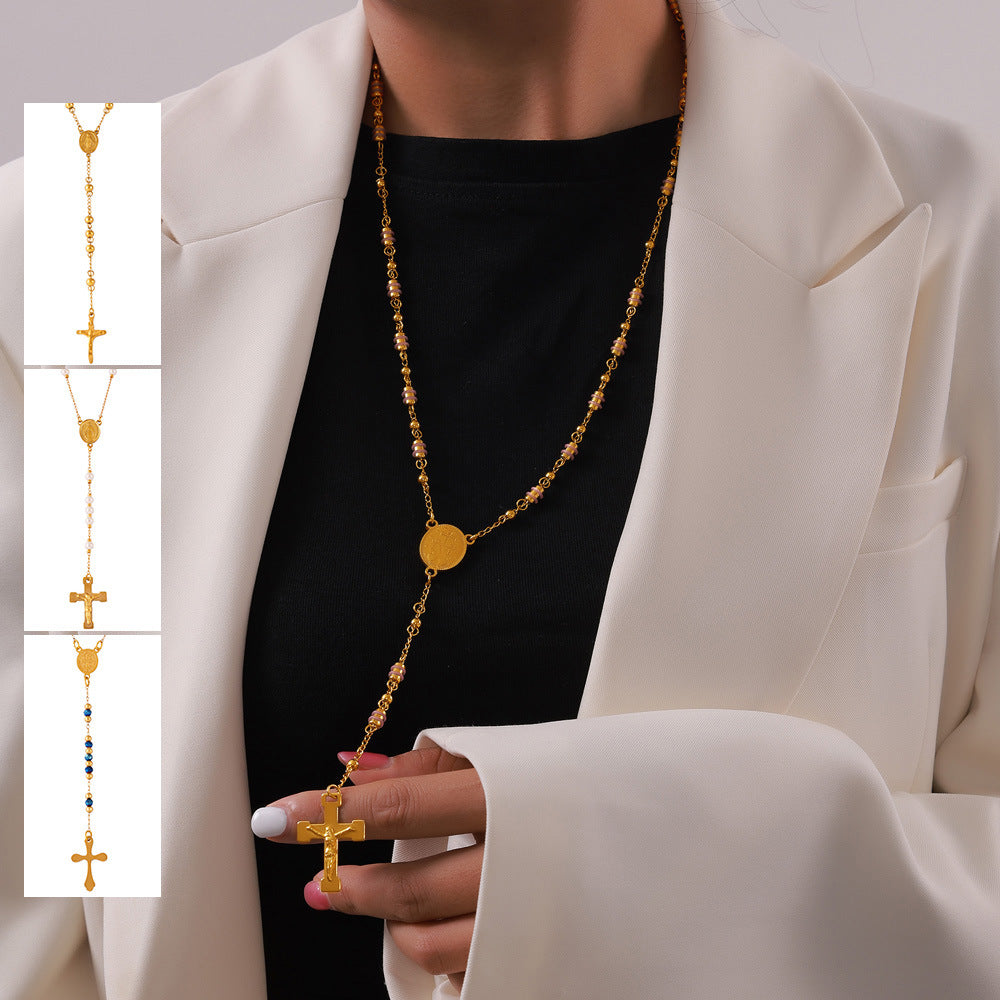 Female Model Wearing Elegant Tassel Cross Pendant Necklace in Gold – Faith Jewelry