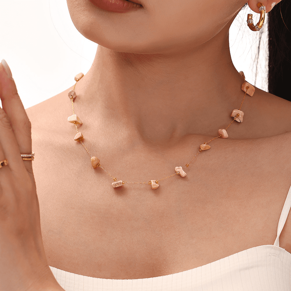 Model wearing light pink natural stone tennis necklace