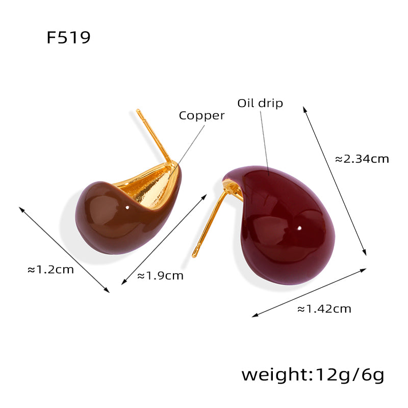 Teardrop-shaped earrings with measurements and material labels on a white background