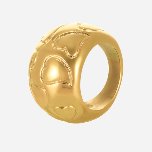 Adjustable gold ring with heart design on white background – minimalist women’s jewelry