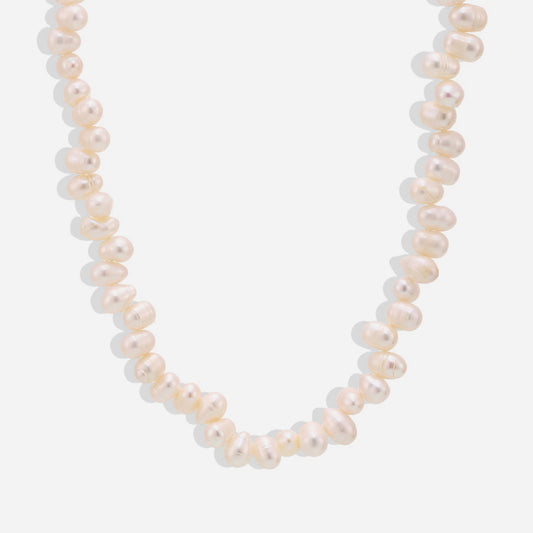 Baroque freshwater pearl necklace with stainless steel chain displayed on white background