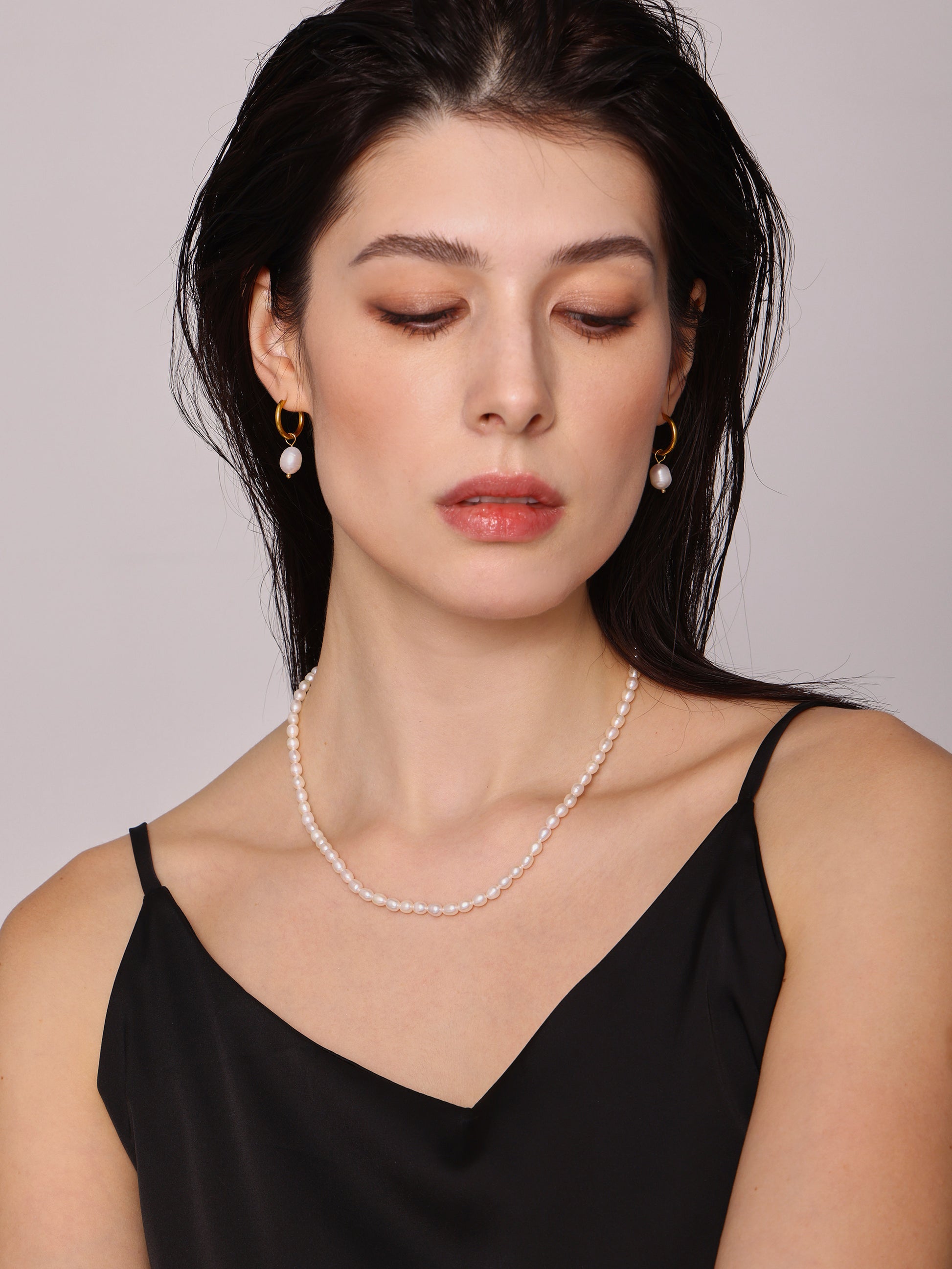 Side Profile of Model Wearing Baroque Freshwater Pearl Choker Necklace